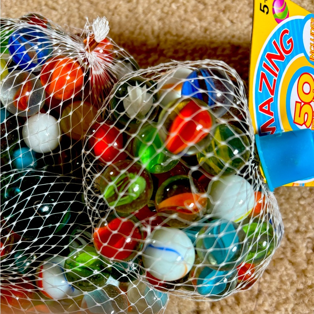 Marbles. 3 sets of 50 marbles.
